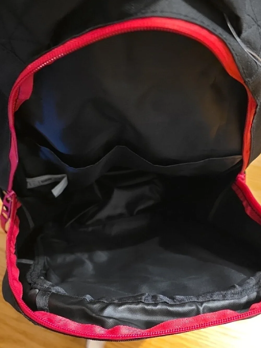 Puma Black Backpack with Pink Accents and Holographic Logo